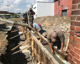 New Showroom Provicence 2017 IMG_5606 Troweling must be done simultaneously with the pour.