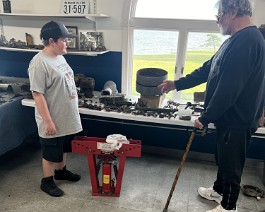 1917 Reading Standard Model T-E 12 HP Twin 2024-06-16 0571 Dick Shappy showing Ryker a few of the Reading Standard parts that were brought back from Oley, Pennsylvania.